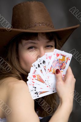 Portrait girl with a playing-cards