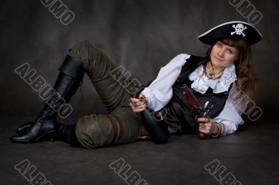 Girl - pirate with pistol and bottle