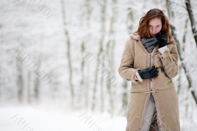 Winter landscape beautiful woman in white landscape