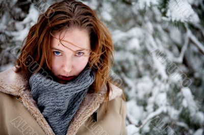 Two colored eyes in winter scene