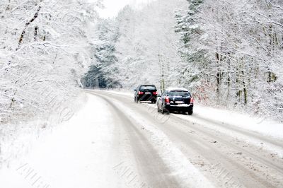 Cars on a white winter road