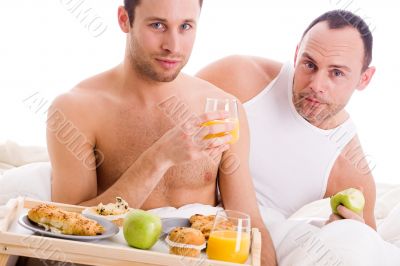 Homo couple enjoy their breakfast