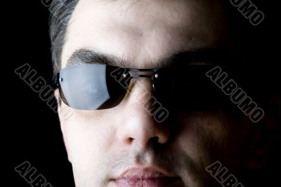 Man on sun glasses macro