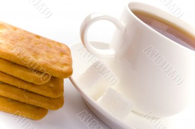 cup of tea, sugar and cookies