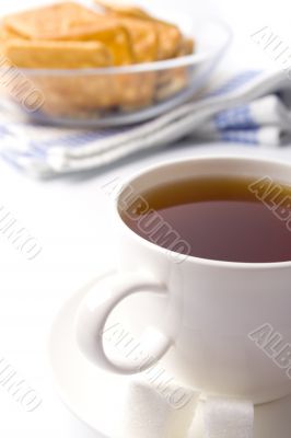 cup of tea, sugar and cookies