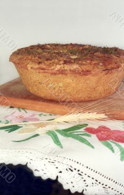 Loaf of feta cheese bread on the breadboard