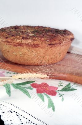 Feta cheese bread on the wooden breadboard