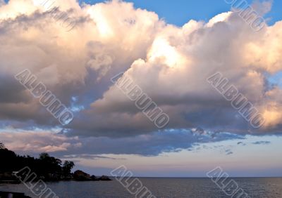Thick clouds over the sea in the evening