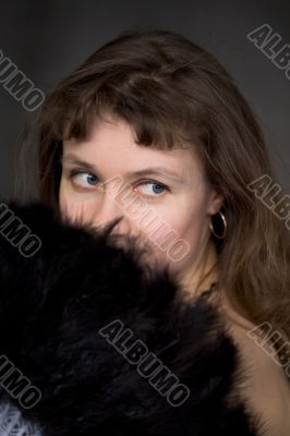 Portrait of the girl with a fan