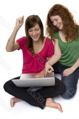 Two teenagers with laptop computer
