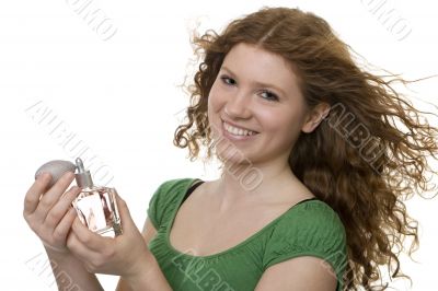 red haired teenager with perfume
