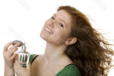 red haired teenager with perfume