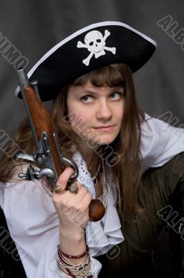 Girl - pirate with pistol in hand