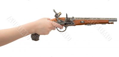 Ancient pistol on female hand