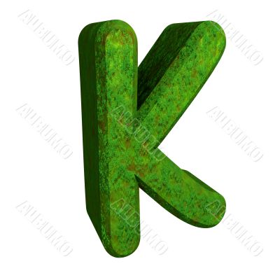 3d letter K in green grass