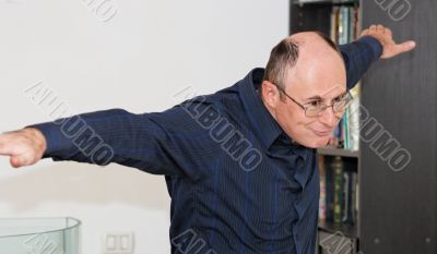 Man spreads his arms