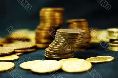 Pile of coins on black