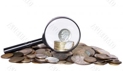 Coins and magnifier