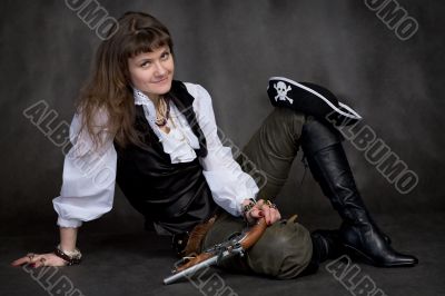 Girl with pistol and pirate hat