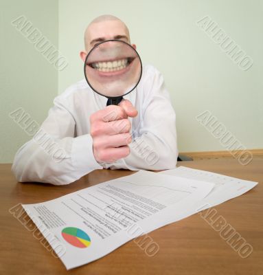 Guy looks through the big magnifier