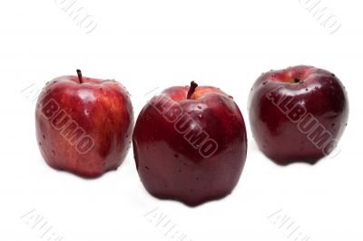 Three red apples