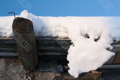 Wooden roof, drooping snow