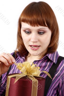 Surprise. Woman with gift.