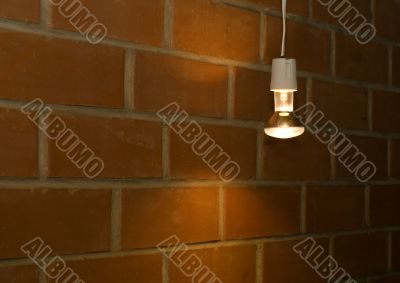 Light near brick wall