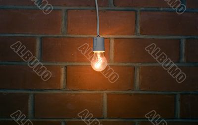 Light near brick wall