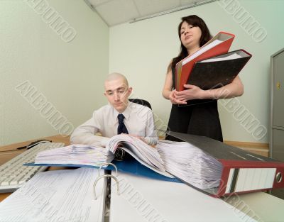 Bookkeeper and the secretary on a workplace