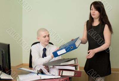 Bookkeeper and the secretary on a workplace