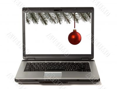 Laptop with christmas toy
