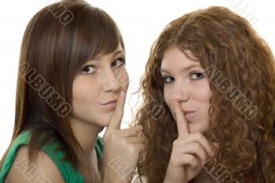 two teenager with gestures quiet