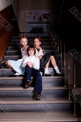 Kids sitting on the stairs