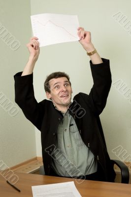 Director on a workplace with a graph