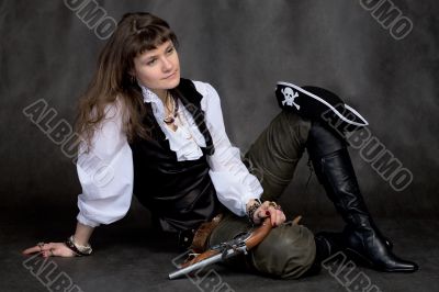 Girl with pistol and pirate hat