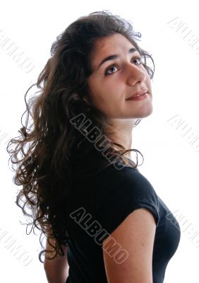Young brunette in profile looking up