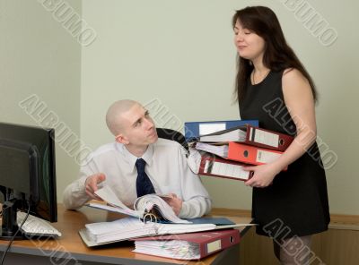 Bookkeeper and the secretary on a workplace
