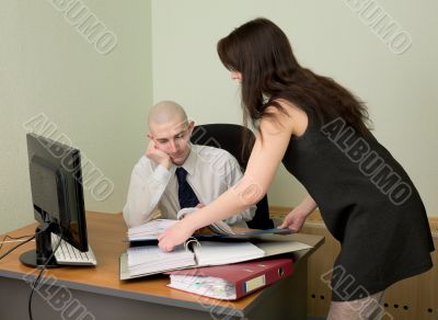 Bookkeeper and the secretary on a workplace