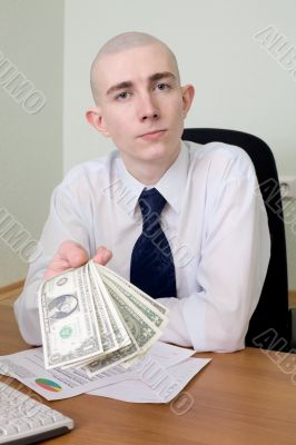 Chief stretching to us a pack of dollars