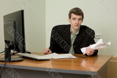Director on a workplace with a crushed paper
