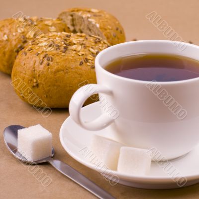 cup of tea, sugar and bread