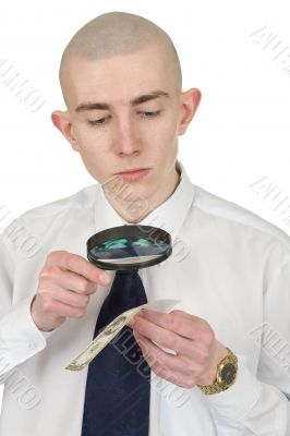 Man studying a counterfeit money
