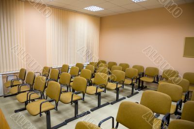 Interior of a conference hall in pink tones