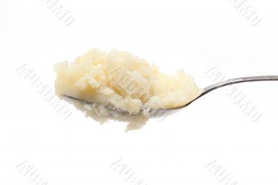 Spoon with mashed potatoes