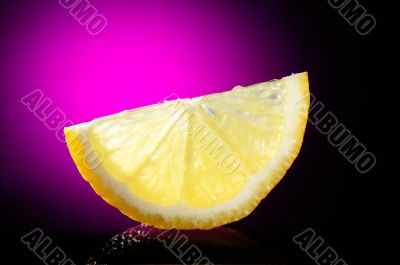 close-up of lemon slice on table glass