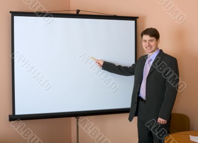Businessman near the white screen