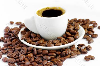 Coffee cup and grain on white