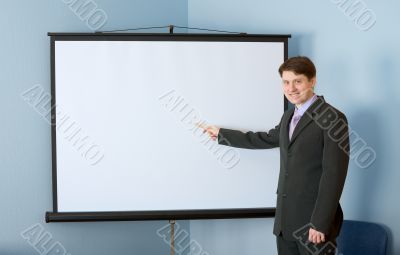 Businessman near the white screen