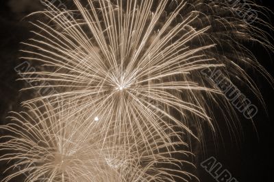 Fireworks lighting the skies sepia